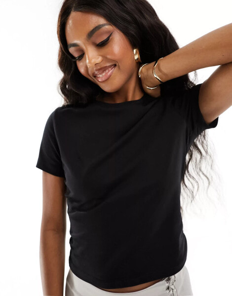 NA-KD x Chloe Monchamp cropped t-shirt in black