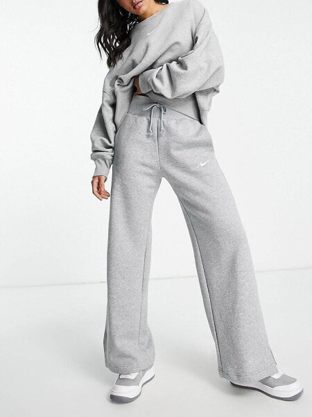 Nike mini swoosh high rise wide leg joggers in grey and sail