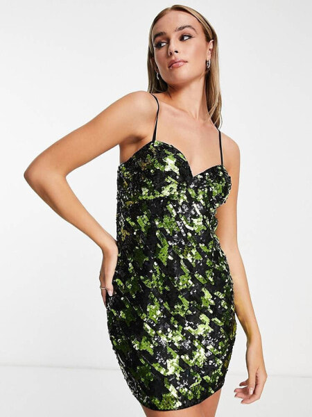 Miss Selfridge Premium festival sequin dogtooth mini dress in black and green
