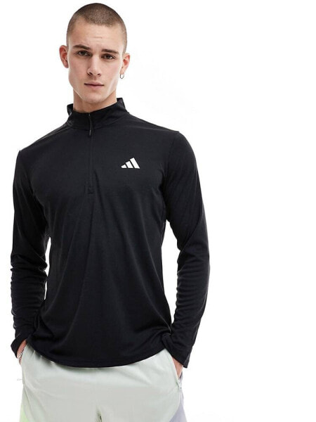 adidas Training Essentials half zip t-shirt in black