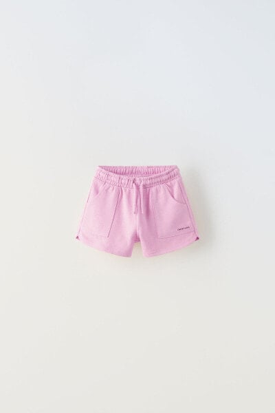 Plush jersey bermuda shorts with pockets