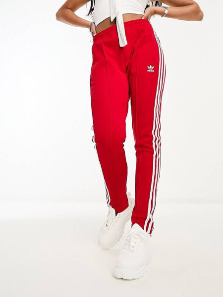 adidas Originals SST track pants in red