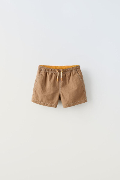 6-14 years/ topstitched swim shorts