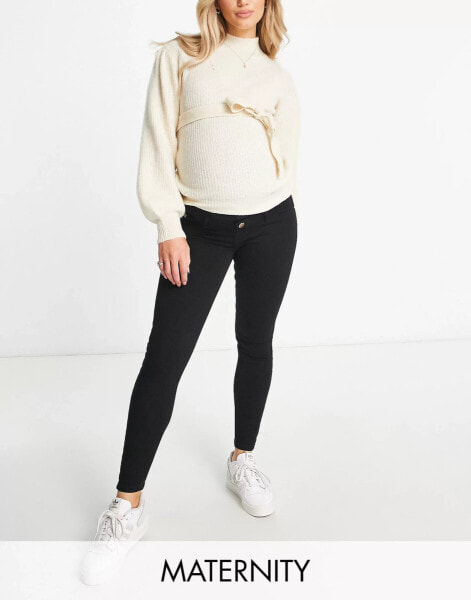 River Island Maternity – Molly – Jeans in Schwarz mit engem Schnitt und Überbauchbund