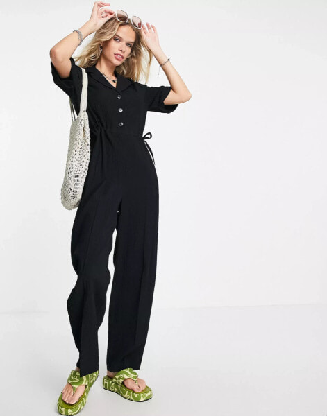 Topshop – Strukturierter, durchgeknöpfter Jumpsuit in Schwarz mit Kordelzug