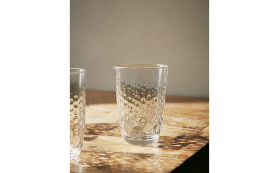 Raised design tumbler