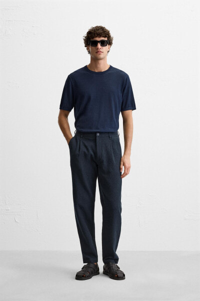 TEXTURED PLEATED TROUSERS