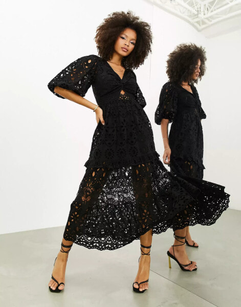 ASOS EDITION – Midikleid in Schwarz mit Lochmuster, verdrehter Vorderpartie und Puffärmeln