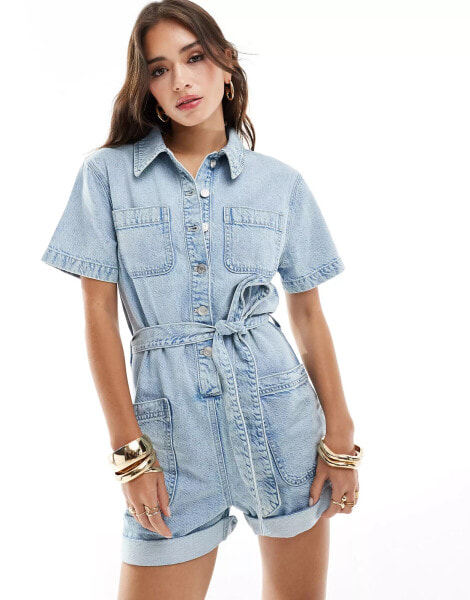 ASOS DESIGN denim boxy playsuit with belt in light wash blue