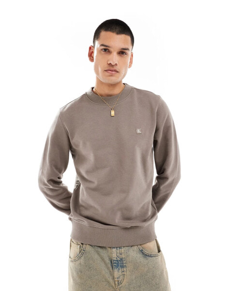 Calvin Klein Jeans embroidered logo crew neck sweatshirt in beige