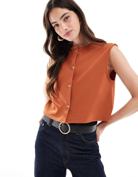 ASOS DESIGN ribbed wide shoulder boxy cropped waistcoat in rust