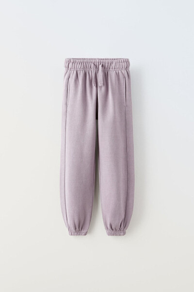 Faded jogging trousers