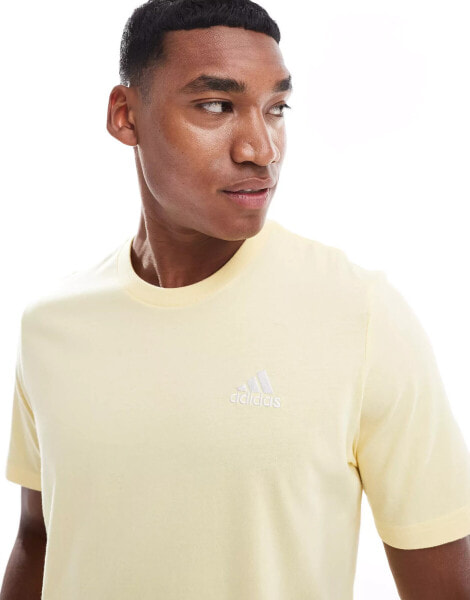 adidas Performance Essentials single jersey embroidered small logo t-shirt in yellow