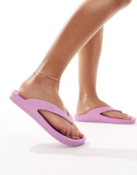 Reef Watercourt flip flops in bright pink