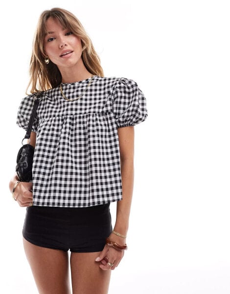 ASOS DESIGN babydoll smock dress with puff sleeve in black gingham