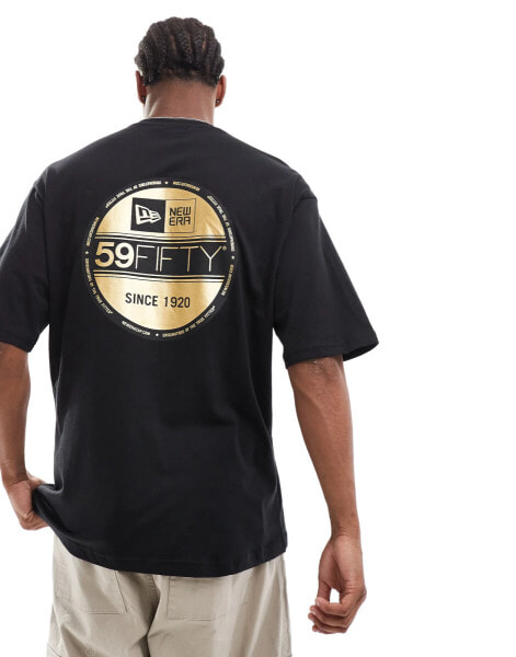 New Era sticker graphic back t-shirt with gold foil in black