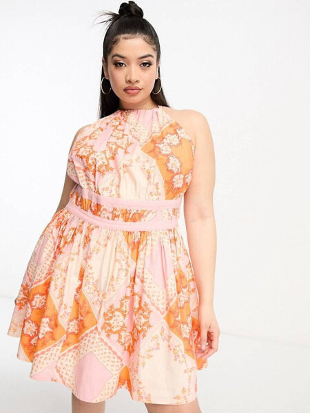 ASOS DESIGN Curve halter mini sundress in pink scarf print