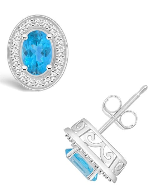 Blue Topaz (1-1/7 ct. t.w.) and Diamond (1/5 ct. t.w.) Halo Studs in Sterling Silver