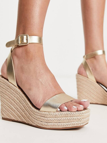 Steve Madden – Upstage – Espadrilles-Sandalen in Gold mit Keilabsatz