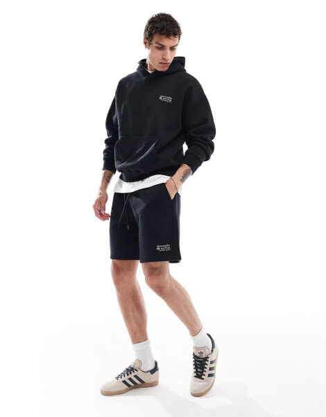 Abercrombie & Fitch small scale logo baggy fit sweat shorts in black co-ord