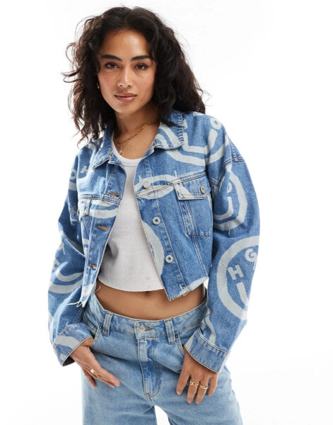 HUGO Blue lou cropped denim jacket in midwash blue with all over logo print