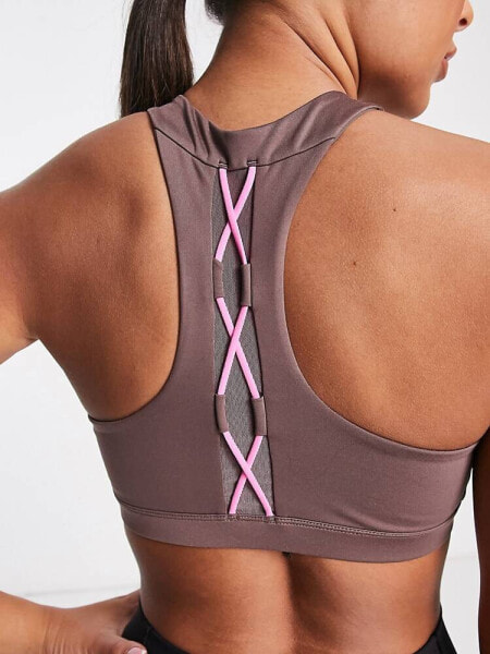 Nike One Training Indy novelty dri fit lace back light support sports bra in plum