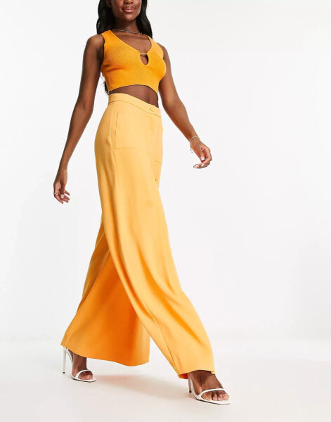 Daska – Elegante Hose mit weitem Bein in Orange