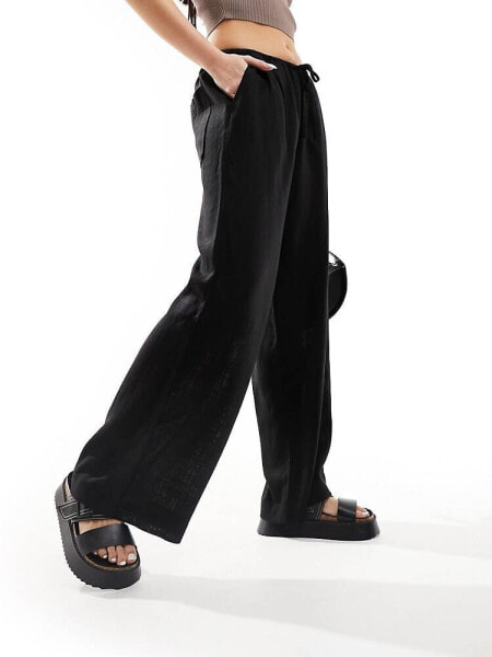 ASOS DESIGN wide leg pull on trouser with linen in black