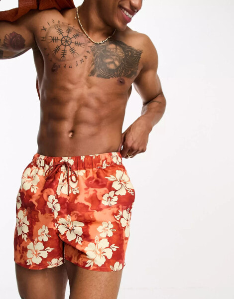 ASOS DESIGN swim shorts in short length in red floral print