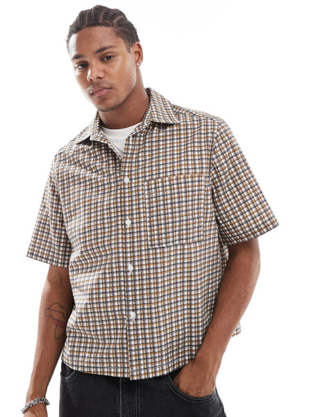 ASOS DESIGN relaxed boxy short sleeve shirt in check