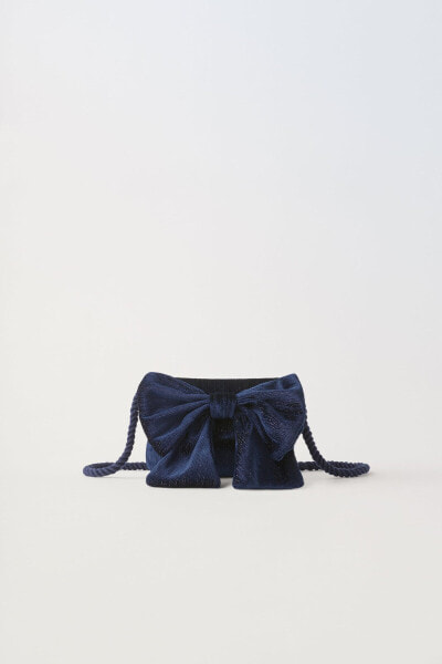 Velvet crossbody bag with bow