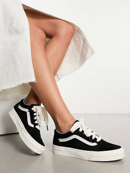 Vans Old Skool trainers in black with oversized laces