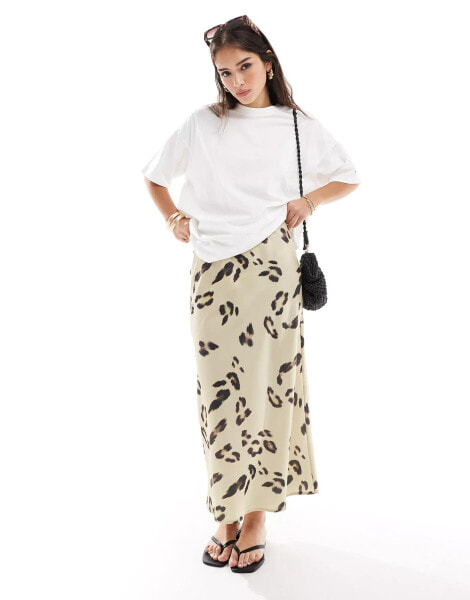 ASOS DESIGN satin bias midi skirt in cream leopard print