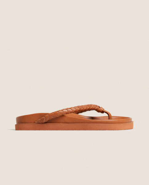 Leather sandals with braided strap