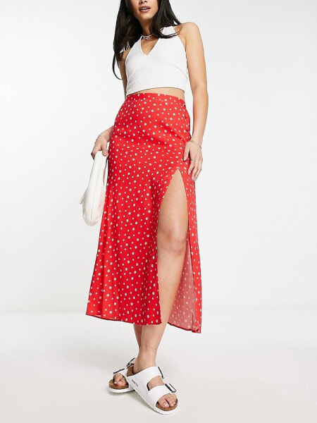 ASOS DESIGN wrap midi skirt with button detail in red ditsy floral