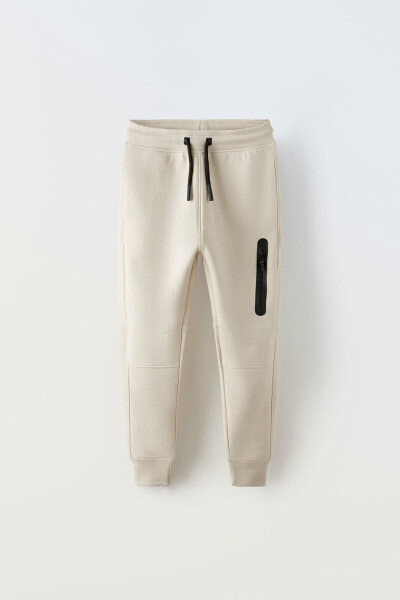 Sporty zip trousers