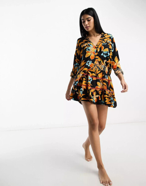 River Island – Geraffter Mini-Strandrock in Schwarz mit Tropen-Print, Kombiteil