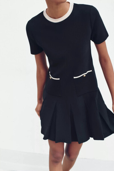 SHORT KNIT DRESS WITH BOX PLEATS