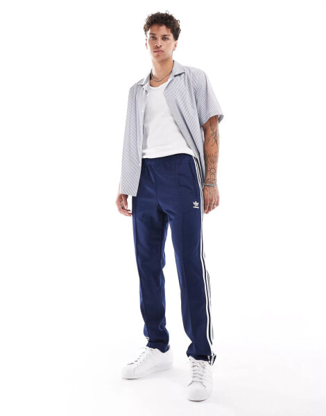 adidas Originals Beckenbauer tracksuit bottoms in indigo