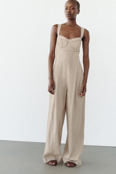 Corsetry-inspired jumpsuit with contrast topstitching