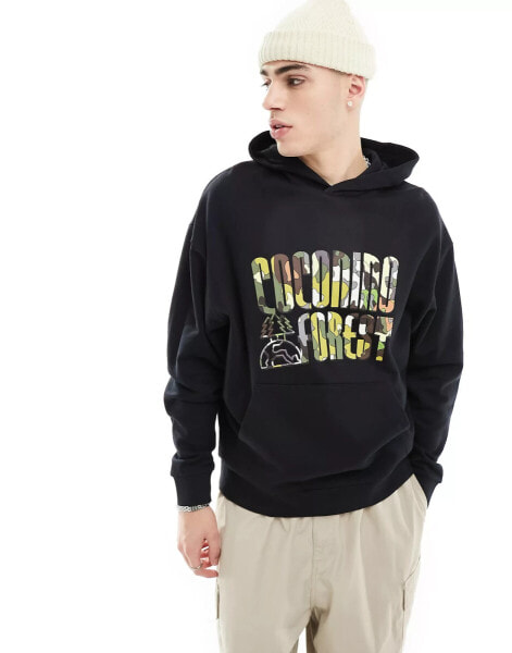 ASOS DESIGN oversized hoodie in black with multicoloured front print