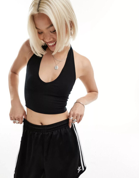 ASOS DESIGN halter neck crop top in black