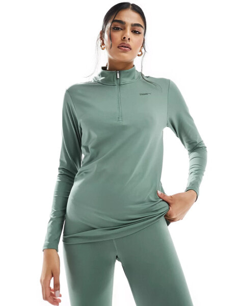 Puma Training Evolve 1/4 zip sweatshirt in light green