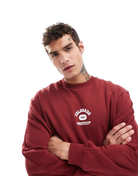 ASOS DESIGN oversized plush sweatshirt in with city print in burgundy