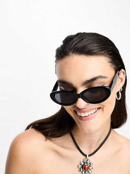 ASOS DESIGN oval sunglasses in black