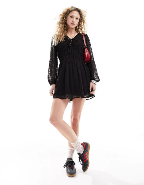 Reclaimed Vintage mini dress with long sleeves in black