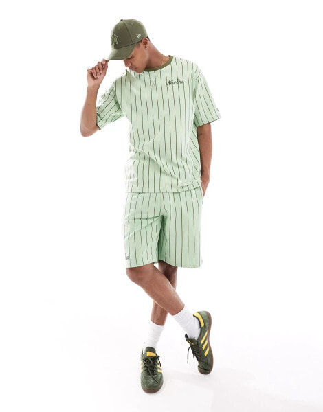 New Era pinstripe t-shirt in green