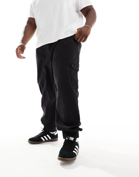 DTT Plus slim fit garment dyed cuffed cargo trousers in black