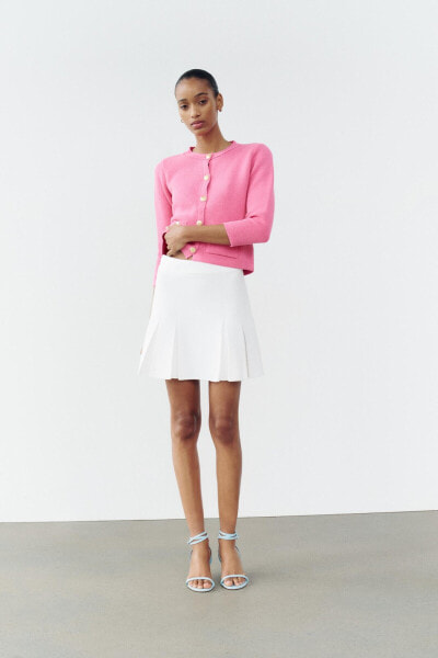 Box pleat knit mini skirt