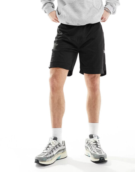 The Couture Club varsity mesh shorts in black